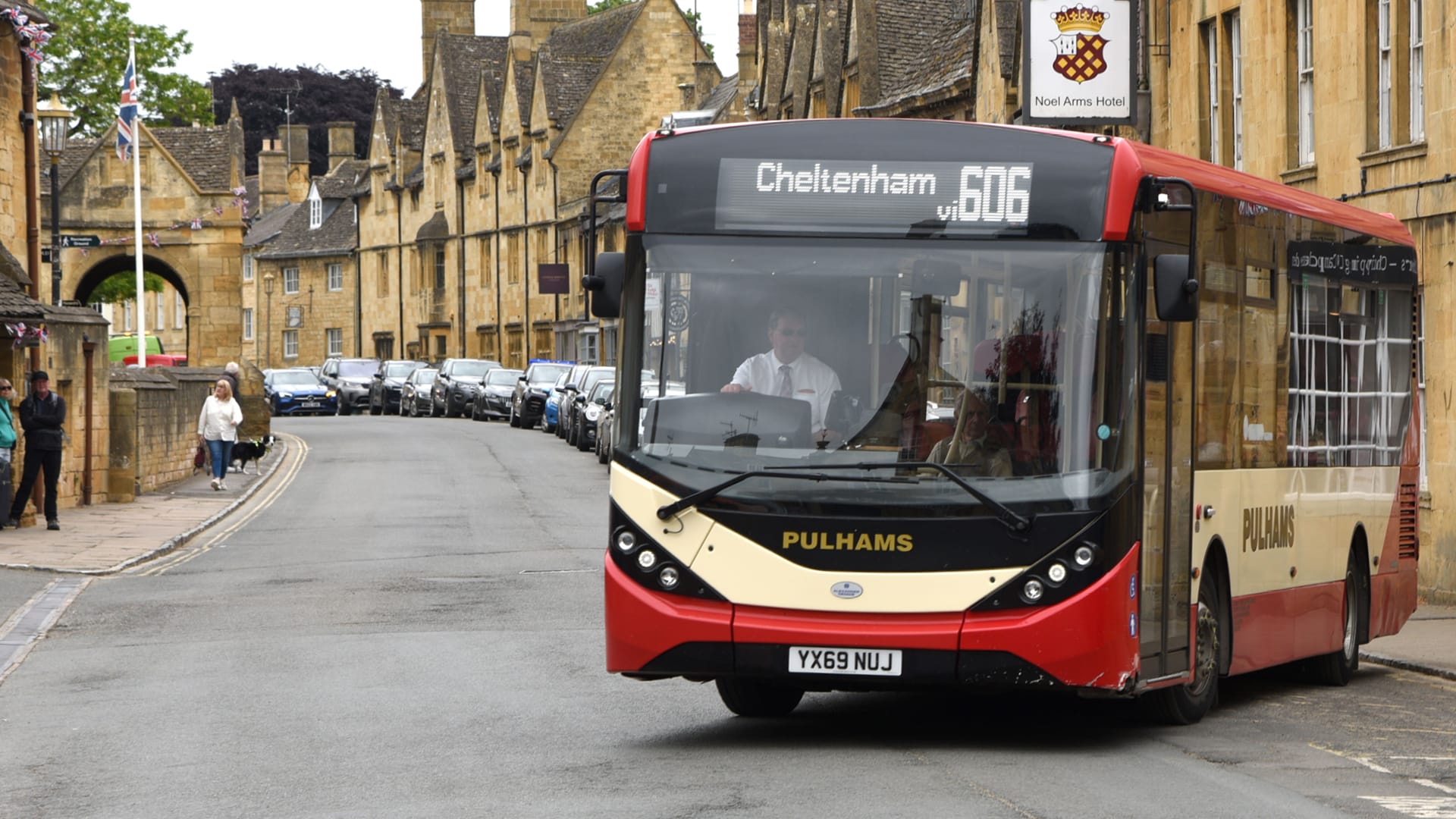 a bus driving down a street